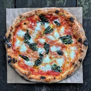 Audrey III Pizza first slice
