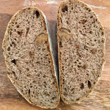 Hubert Pain au Levain, Raisins, et Noix  first slice