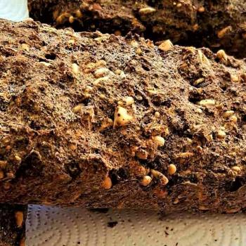 Kvásoček Poppy bread with nuts, sunflower, buckwheat first slice