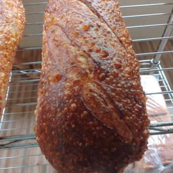 Luana Breads, pizza , crepes first slice