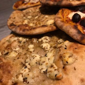 Nancy Arabic bread pizza first slice