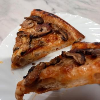 V9 Pizza second slice